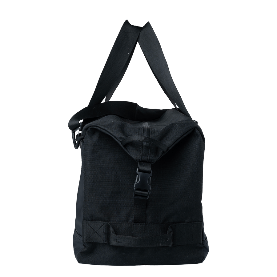 The Maverik 3003930 is a black backpack with a top flap secured by a buckle, adjustable shoulder straps, and a handle. It is specially designed for lacrosse players, featuring a minimalist design with stick storage loops for easy transport.
