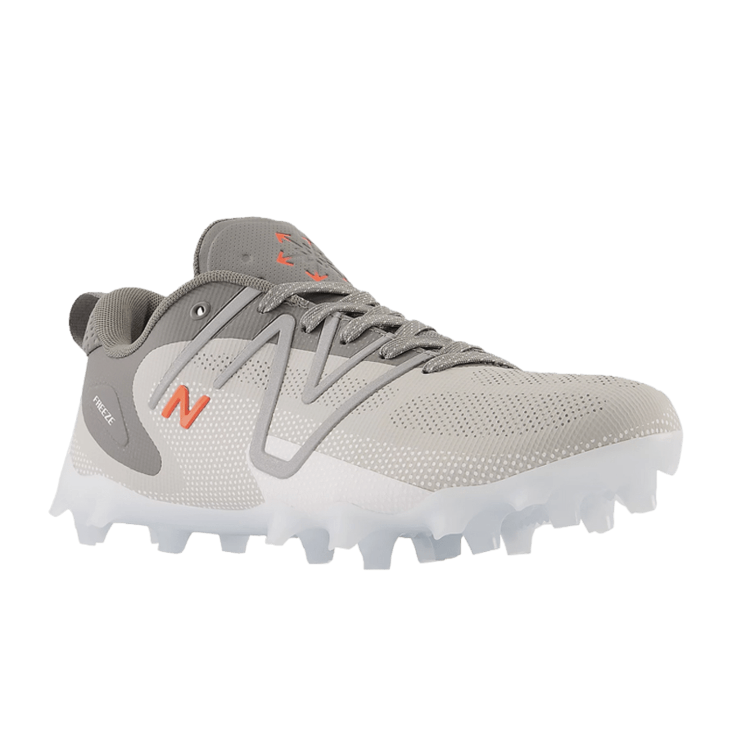 The New Balance Freeze LX 4 Jr. Cleats in grey, designed for lacrosse, feature a QUIX Outsole with white studs and orange accents. The cleats boast a sleek design with a lightweight synthetic mesh upper and a prominent "N" on the side, providing excellent traction on grass or turf surfaces.