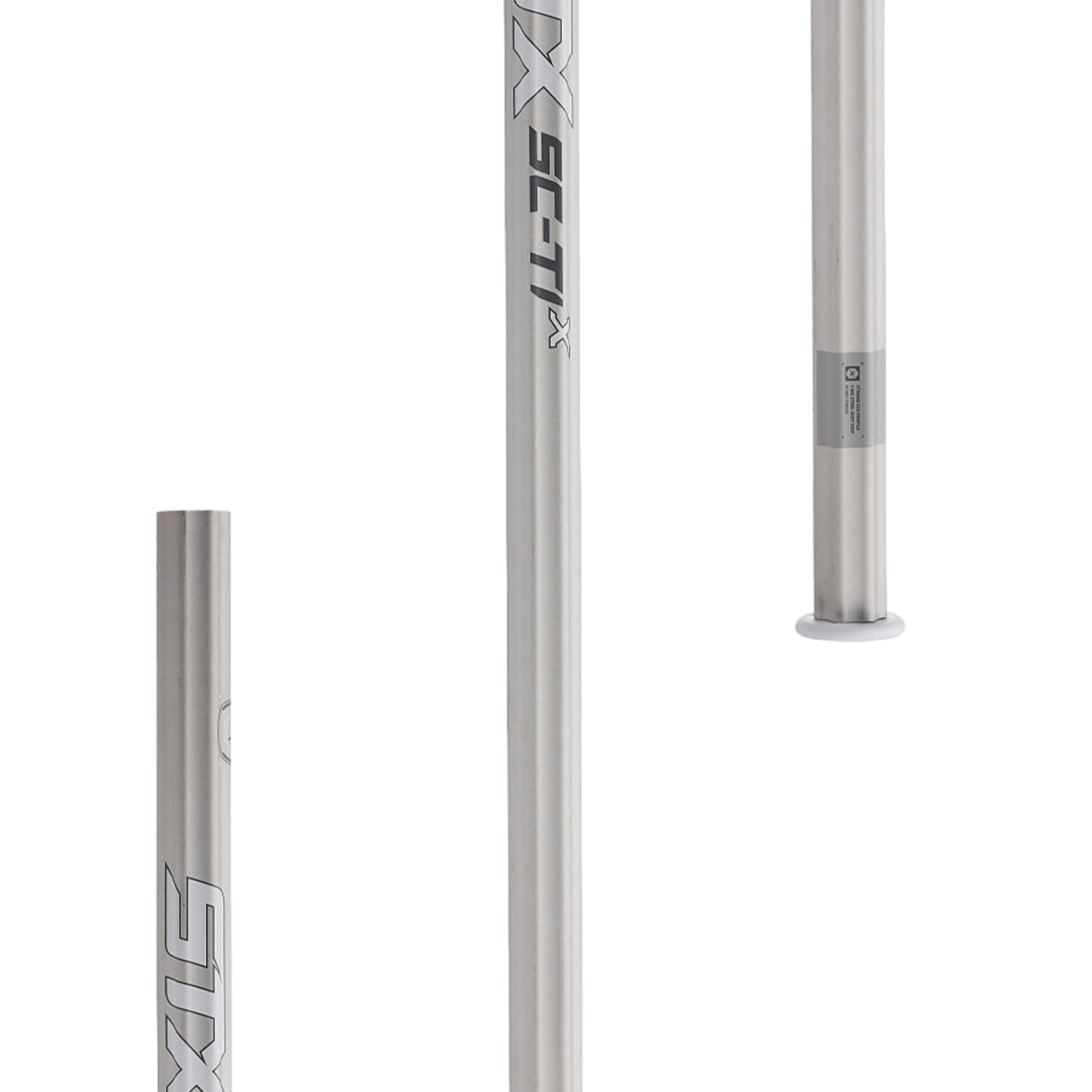 Three STX HE AAX0 64/BK/BOM lacrosse shafts, crafted from Sc-Ti alloy, are displayed on a white background. They feature the STX logo and "SC-TI x" markings. Positioned at different angles, these silver lightweight shafts showcase their cylindrical shape and sleek metallic finish.