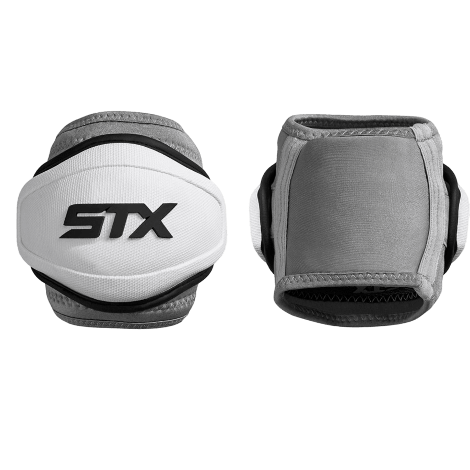 Two STX Stallion 500 Elbow Pads, featuring a gray and white design for elite-level defensemen, are displayed with the "STX" logo prominently on the front. One pad is shown from a frontal view while the other is viewed from the side, both set against a solid green backdrop to emphasize their exceptional mobility and comfort.