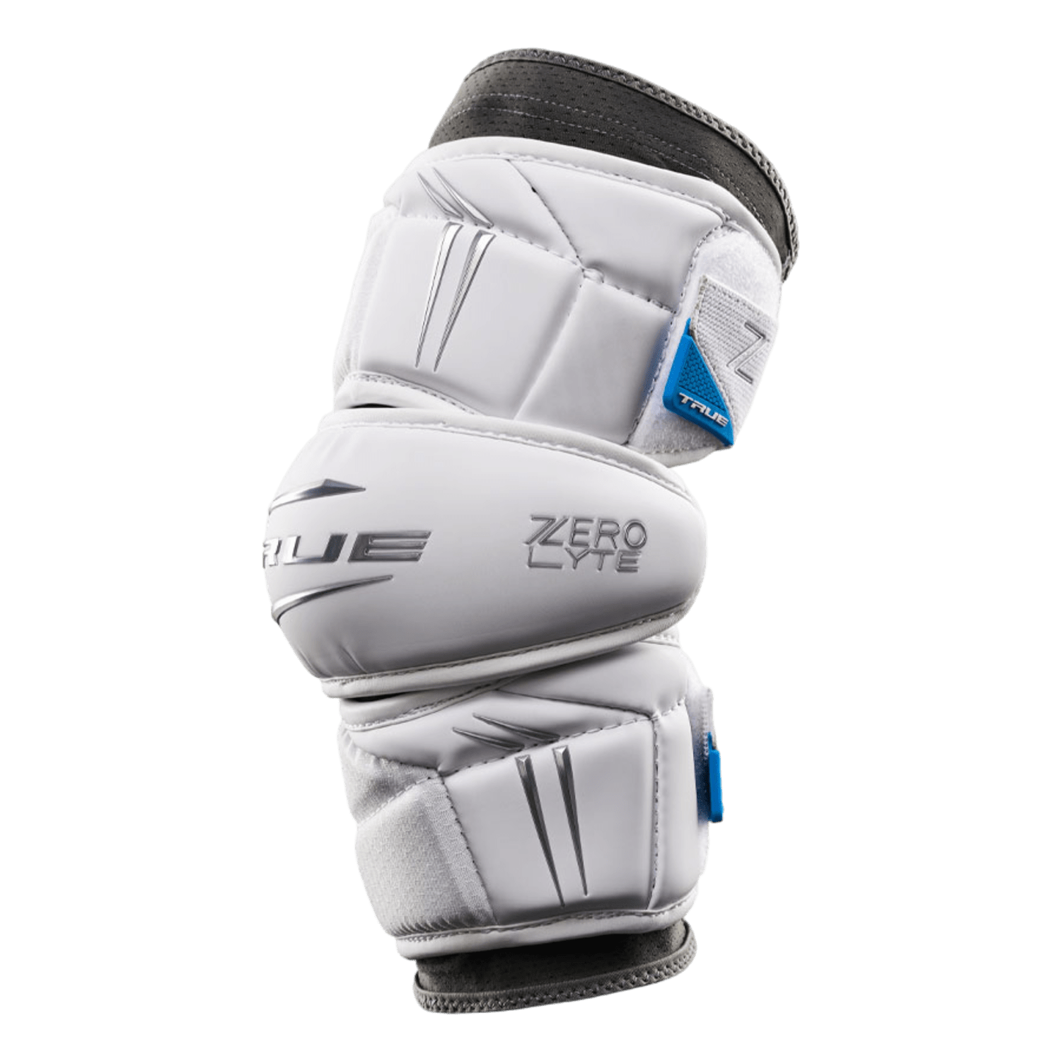 The True Zerolyte Arm Pads are white padded hockey elbow protectors featuring black accents and blue details. Designed for elite players, these pads offer maximum mobility with their angular patterns and securing straps, proudly labeled with "Zero Lyte" and "TRUE.