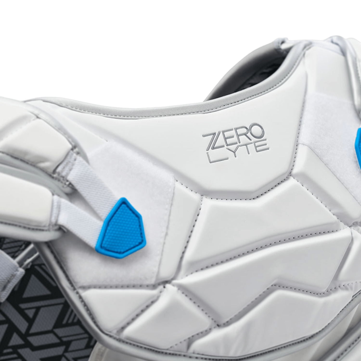 Close-up of the TRUE LAX-20-ZL-SP-L-WH protective vest in white and gray, featuring blue accents and the text "ZERO LYTE." Specifically designed for men's lacrosse shoulder pads, it provides elite-level protection with padded segments and textured fabric, ensuring Freedom in Motion for athletic activities.