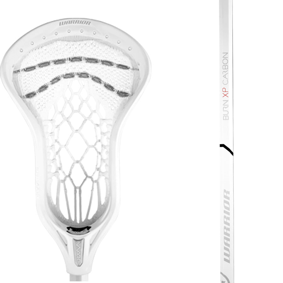 A close-up view of the Warrior Burn XP-O Warp Complete Stick, displaying a white lacrosse stick with a mesh net and the brand name "Warrior" on the handle. The side of the shaft discreetly reads "Burn XP Carbon," enhanced with Therma-Loc resin for durability, and it features a mid-pocket design for optimal control.