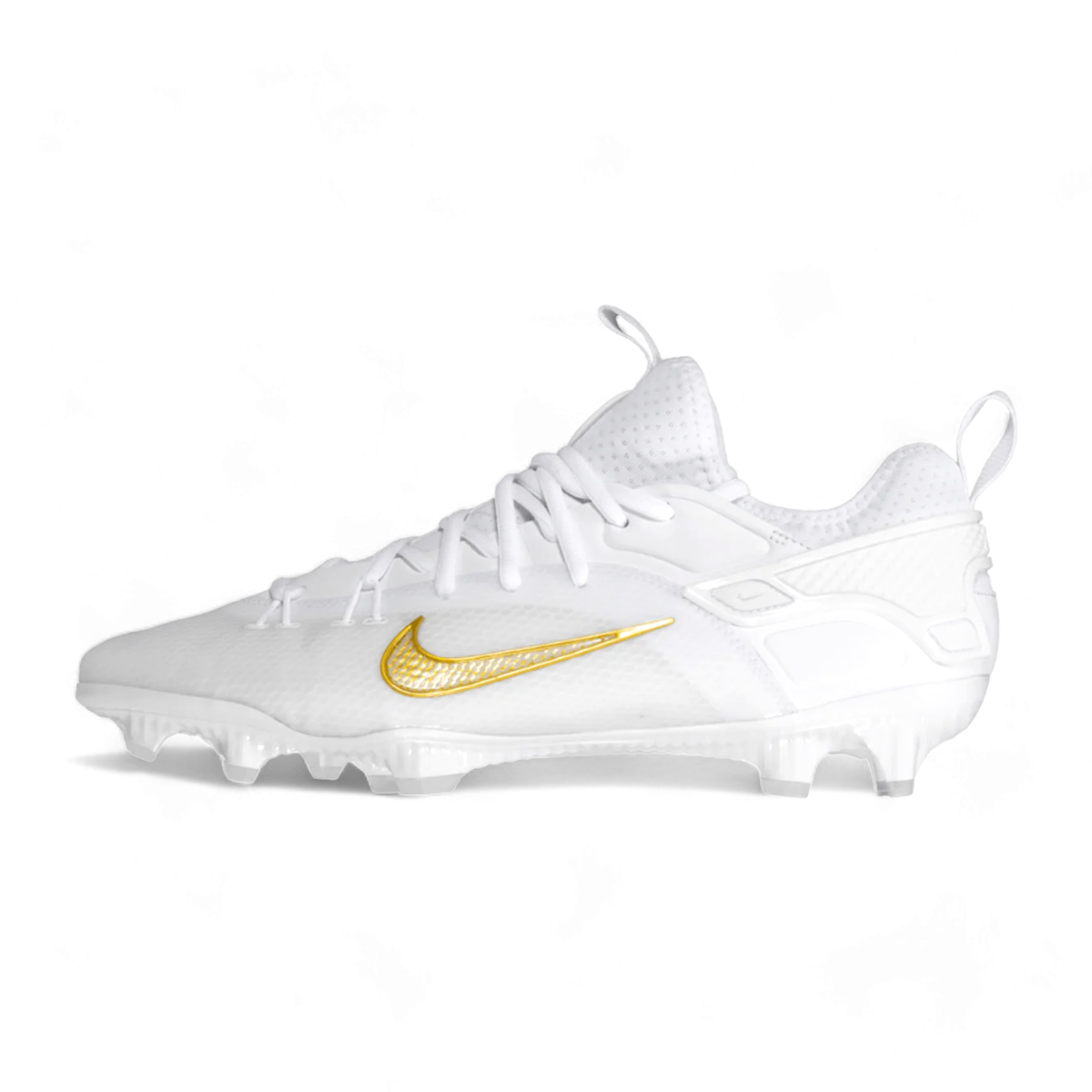 The image shows the bottom view of a white athletic shoe with a black Nike swoosh logo. The sole features a textured pattern with multiple grooves and small nubs for multidirectional traction. The design appears streamlined, likely part of the Nike Alpha Huarache 9 Elite Low for performance sports.